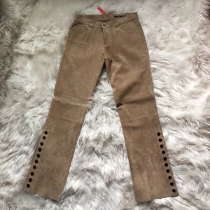 Vintage leather pants with button leg detail